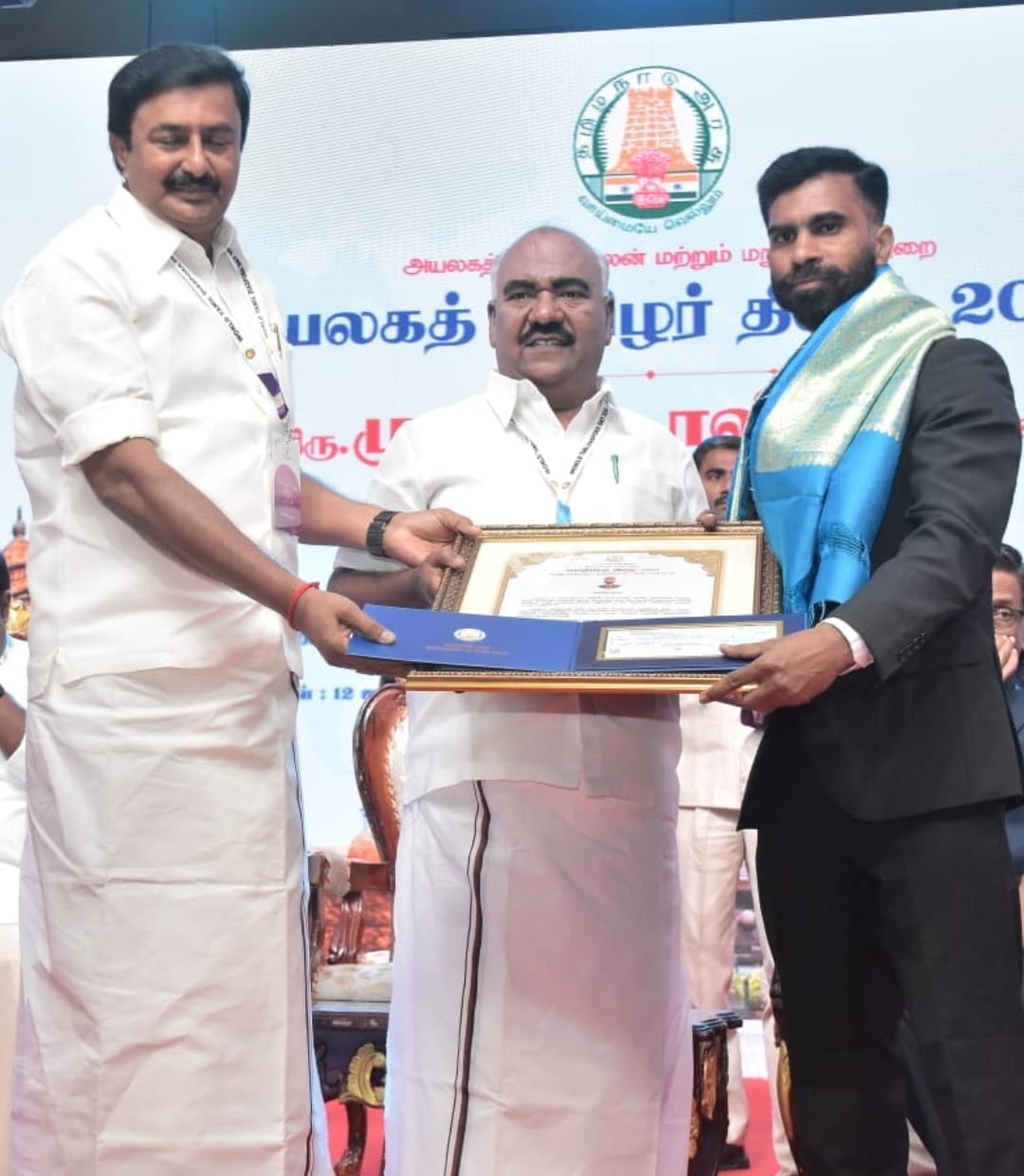 Linguistic Award to Dr. Arogya Raj, a South Korea Tamilian